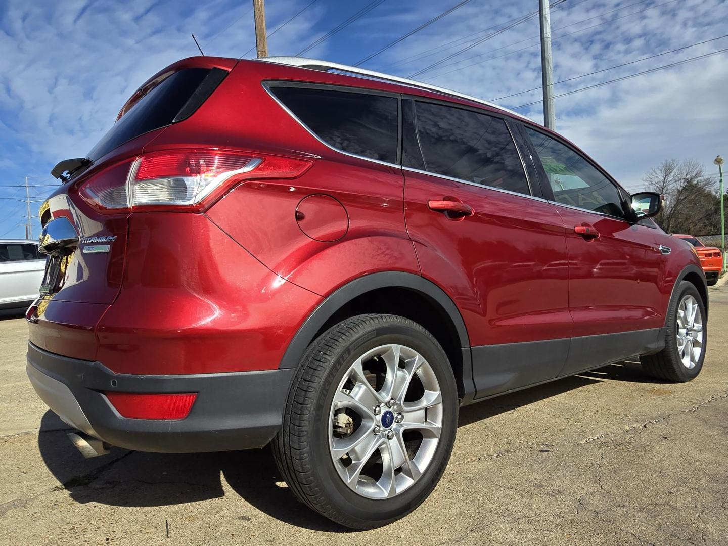 2016 RED Ford Escape Titanium (1FMCU0J96GU) with an 2.0L L4 DOHC 16V engine, 6-Speed Automatic transmission, located at 2660 S.Garland Avenue, Garland, TX, 75041, (469) 298-3118, 32.885551, -96.655602 - Photo#3