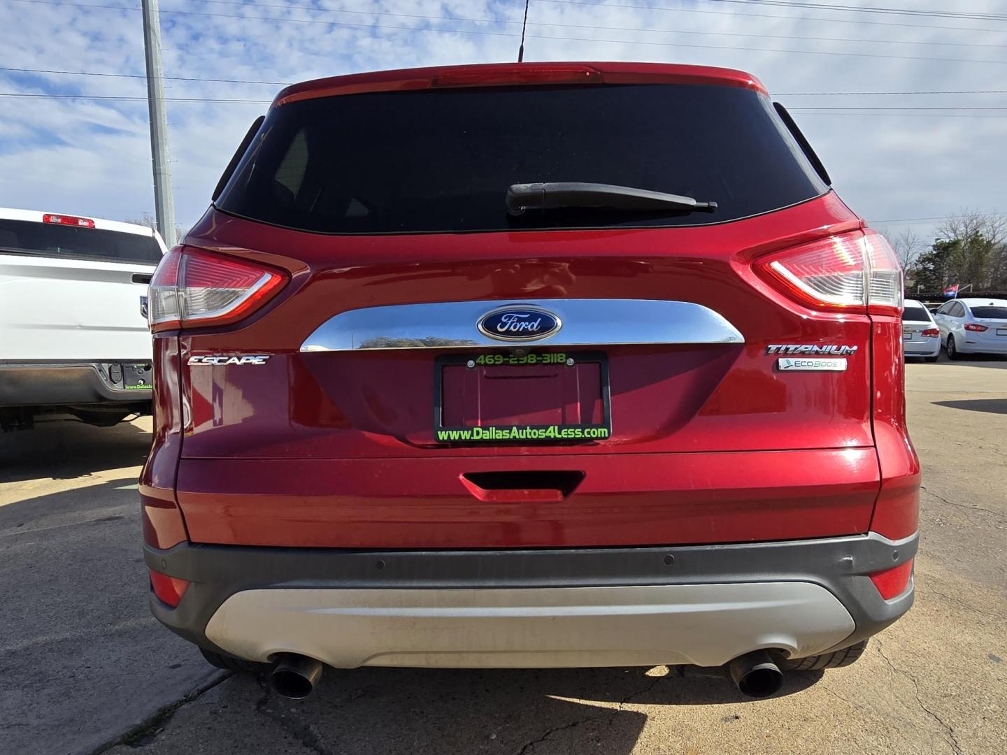 2016 RED Ford Escape Titanium (1FMCU0J96GU) with an 2.0L L4 DOHC 16V engine, 6-Speed Automatic transmission, located at 2660 S.Garland Avenue, Garland, TX, 75041, (469) 298-3118, 32.885551, -96.655602 - Photo#4
