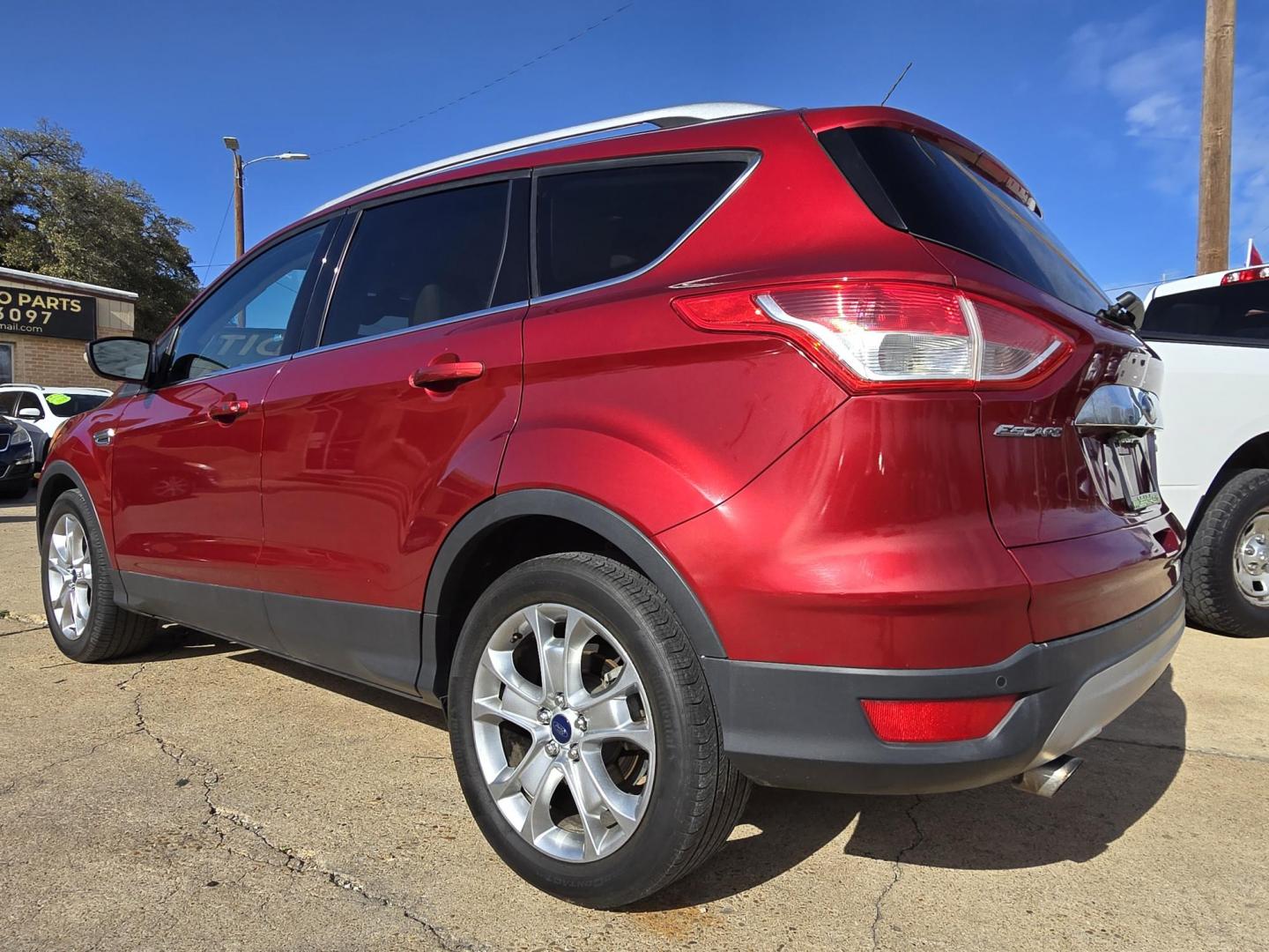 2016 RED Ford Escape Titanium (1FMCU0J96GU) with an 2.0L L4 DOHC 16V engine, 6-Speed Automatic transmission, located at 2660 S.Garland Avenue, Garland, TX, 75041, (469) 298-3118, 32.885551, -96.655602 - Photo#5