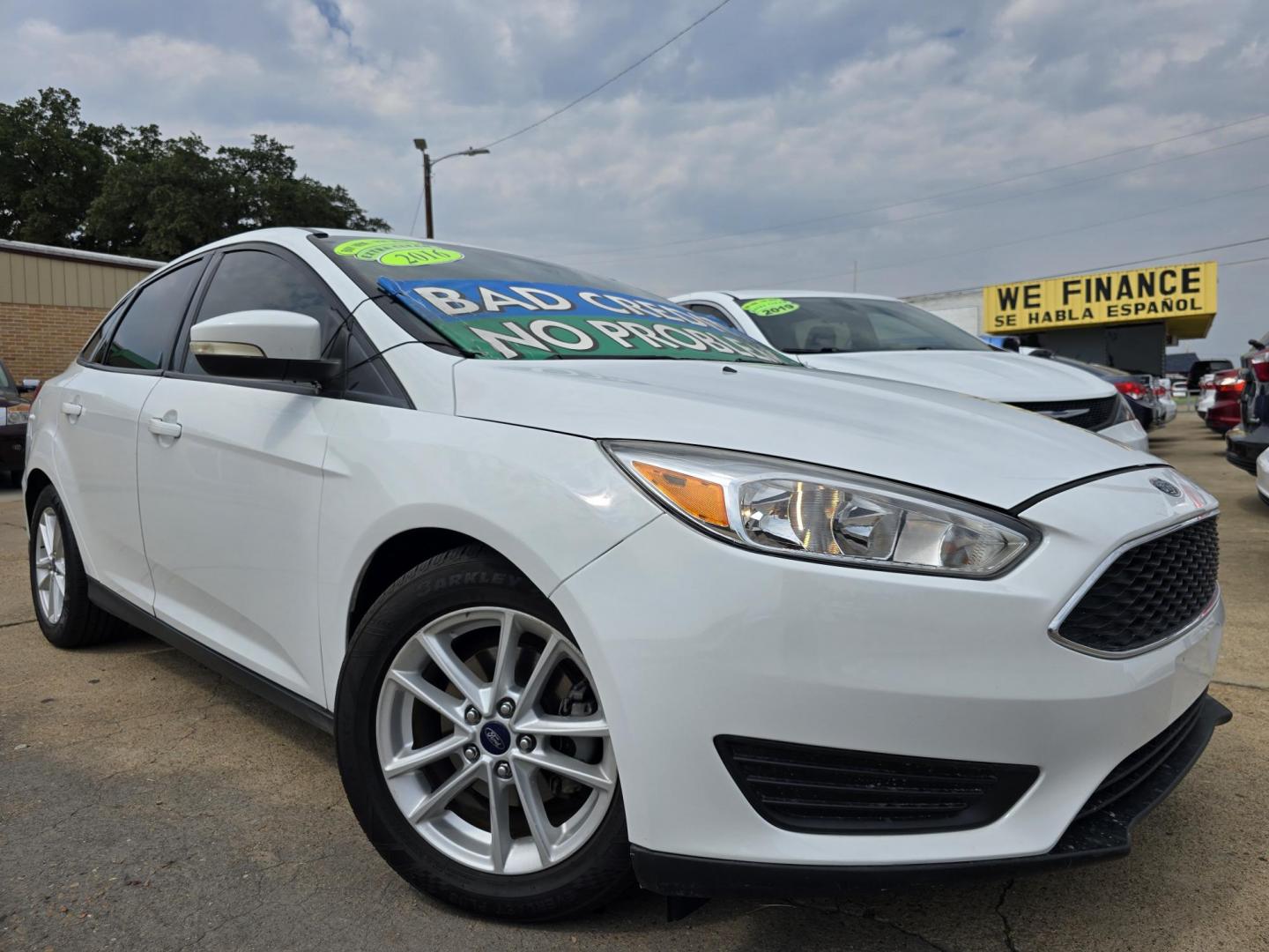 2016 WHITE Ford Focus SE (1FADP3F24GL) with an 2.0L L4 DOHC 16V engine, AUTO transmission, located at 2660 S.Garland Avenue, Garland, TX, 75041, (469) 298-3118, 32.885551, -96.655602 - Welcome to DallasAutos4Less, one of the Premier BUY HERE PAY HERE Dealers in the North Dallas Area. We specialize in financing to people with NO CREDIT or BAD CREDIT. We need proof of income, proof of residence, and a ID. Come buy your new car from us today!! This is a Super Clean 2016 FORD FOCUS - Photo#0