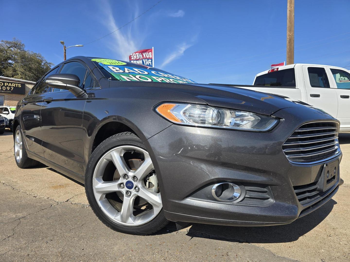 2016 GRAY Ford Fusion SE (3FA6P0H9XGR) with an 2.0L L4 DOHC 16V engine, 6-Speed Automatic transmission, located at 2660 S.Garland Avenue, Garland, TX, 75041, (469) 298-3118, 32.885551, -96.655602 - Photo#0