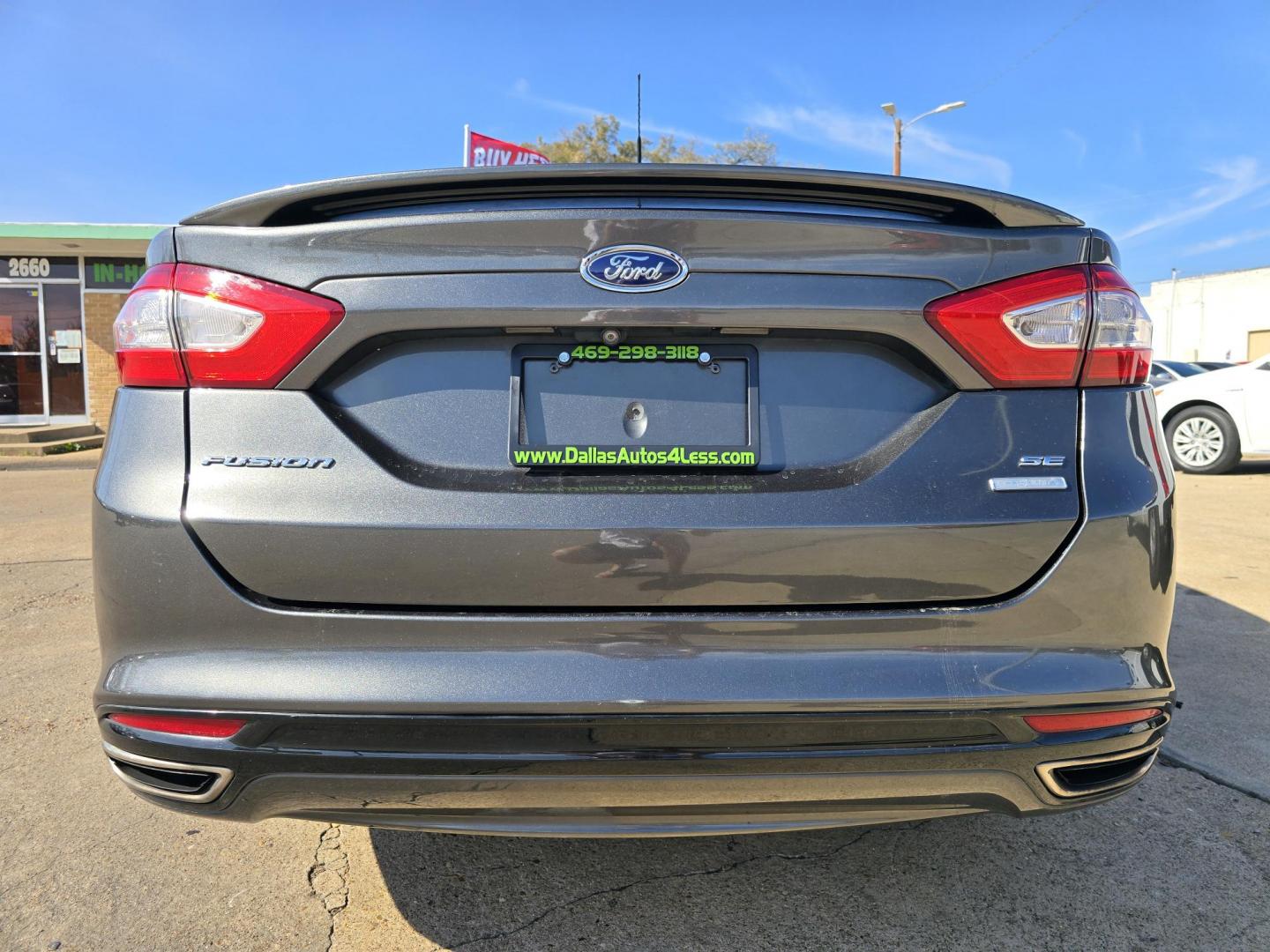 2016 GRAY Ford Fusion SE (3FA6P0H9XGR) with an 2.0L L4 DOHC 16V engine, 6-Speed Automatic transmission, located at 2660 S.Garland Avenue, Garland, TX, 75041, (469) 298-3118, 32.885551, -96.655602 - Photo#4