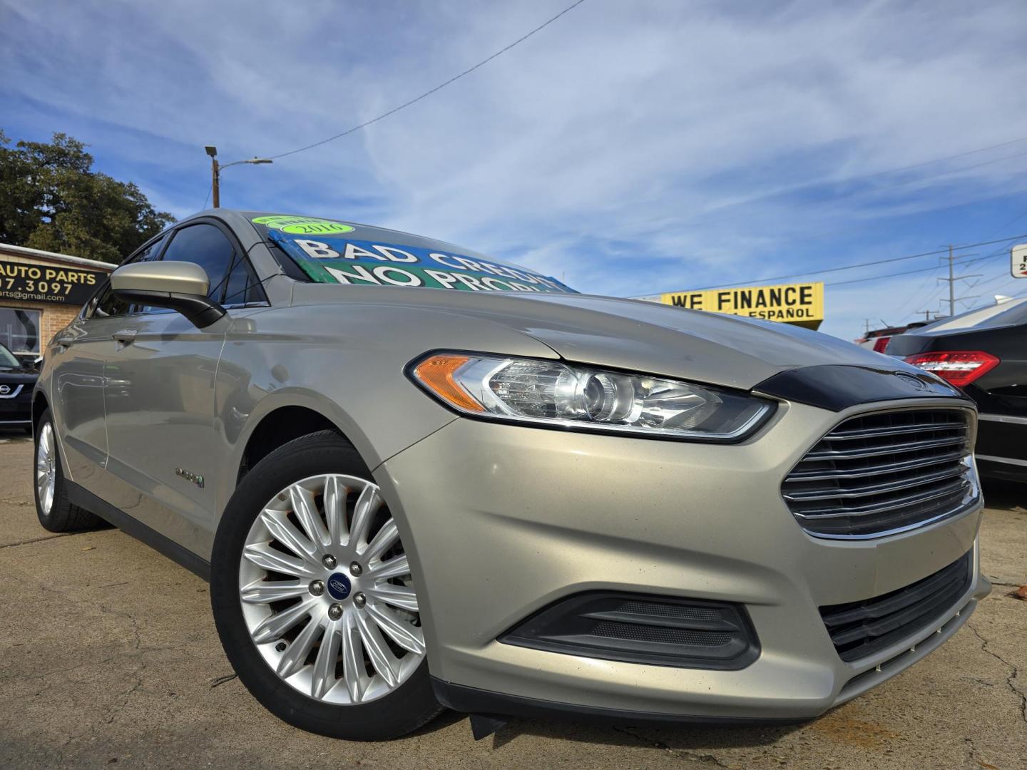 2016 GOLD Ford Fusion Hybrid S (3FA6P0UU2GR) with an 2.0L L4 DOHC 16V HYBRID engine, CVT transmission, located at 2660 S.Garland Avenue, Garland, TX, 75041, (469) 298-3118, 32.885551, -96.655602 - Photo#0