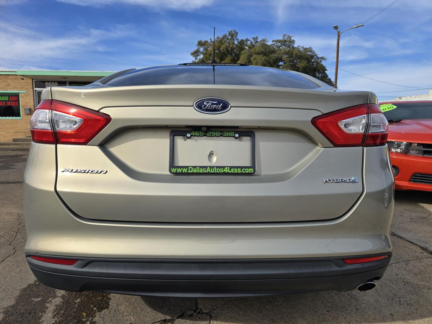2016 GOLD Ford Fusion Hybrid S (3FA6P0UU2GR) with an 2.0L L4 DOHC 16V HYBRID engine, CVT transmission, located at 2660 S.Garland Avenue, Garland, TX, 75041, (469) 298-3118, 32.885551, -96.655602 - Photo#4