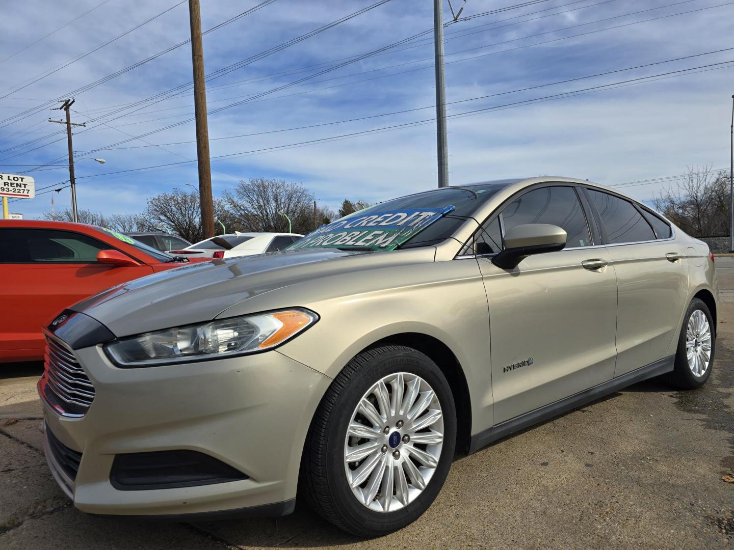 2016 GOLD Ford Fusion Hybrid S (3FA6P0UU2GR) with an 2.0L L4 DOHC 16V HYBRID engine, CVT transmission, located at 2660 S.Garland Avenue, Garland, TX, 75041, (469) 298-3118, 32.885551, -96.655602 - Photo#7