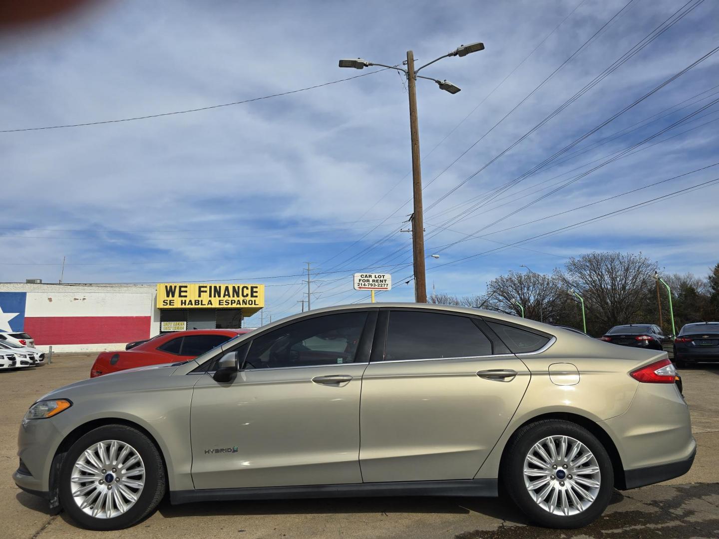 2016 GOLD Ford Fusion Hybrid S (3FA6P0UU2GR) with an 2.0L L4 DOHC 16V HYBRID engine, CVT transmission, located at 2660 S.Garland Avenue, Garland, TX, 75041, (469) 298-3118, 32.885551, -96.655602 - Photo#6