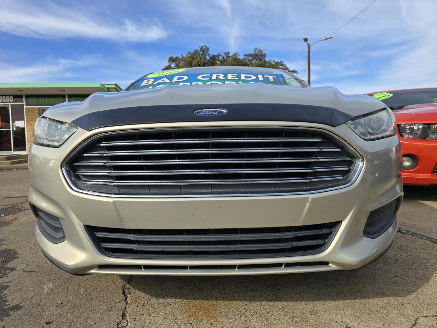 2016 GOLD Ford Fusion Hybrid S (3FA6P0UU2GR) with an 2.0L L4 DOHC 16V HYBRID engine, CVT transmission, located at 2660 S.Garland Avenue, Garland, TX, 75041, (469) 298-3118, 32.885551, -96.655602 - Photo#9