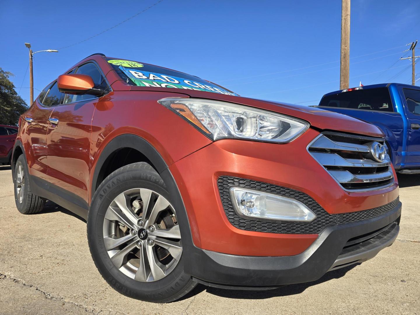 2016 ORANGE Hyundai Santa Fe Sport (5XYZU3LBXGG) with an 2.4L L4 DOHC 16V engine, 6-Speed Automatic transmission, located at 2660 S.Garland Avenue, Garland, TX, 75041, (469) 298-3118, 32.885551, -96.655602 - Photo#0