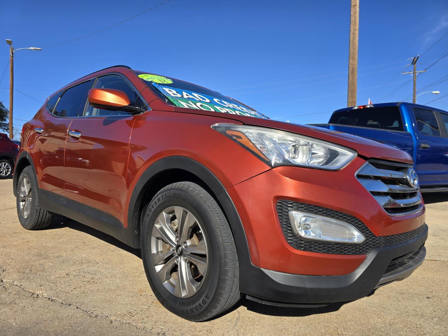 2016 ORANGE Hyundai Santa Fe Sport (5XYZU3LBXGG) with an 2.4L L4 DOHC 16V engine, 6-Speed Automatic transmission, located at 2660 S.Garland Avenue, Garland, TX, 75041, (469) 298-3118, 32.885551, -96.655602 - Photo#1
