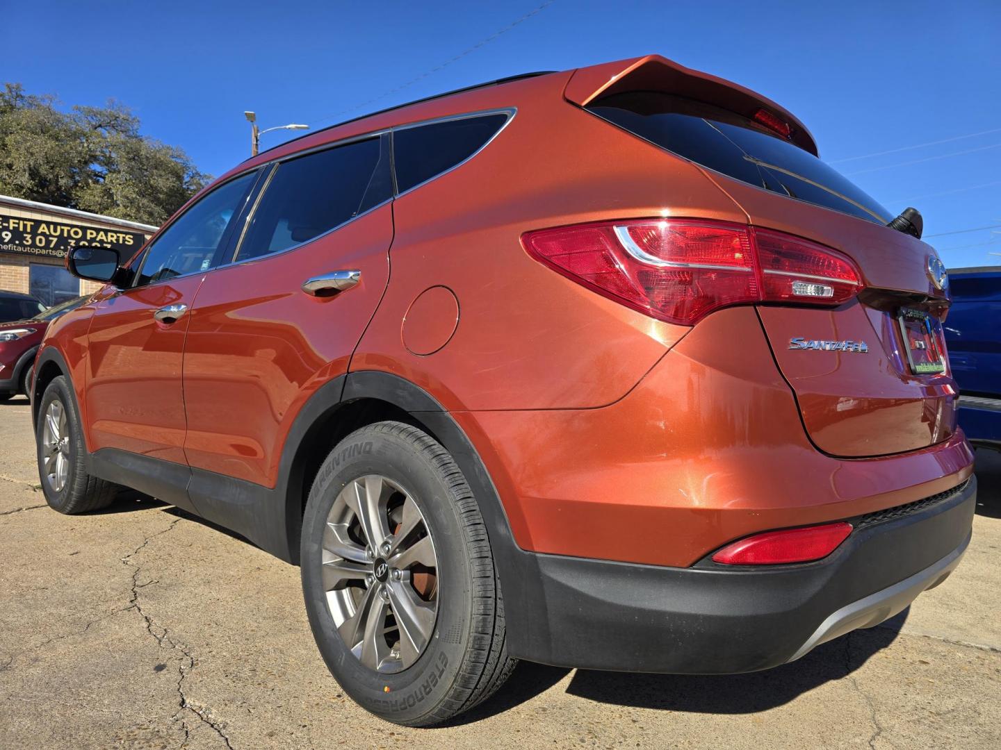 2016 ORANGE Hyundai Santa Fe Sport (5XYZU3LBXGG) with an 2.4L L4 DOHC 16V engine, 6-Speed Automatic transmission, located at 2660 S.Garland Avenue, Garland, TX, 75041, (469) 298-3118, 32.885551, -96.655602 - Photo#5