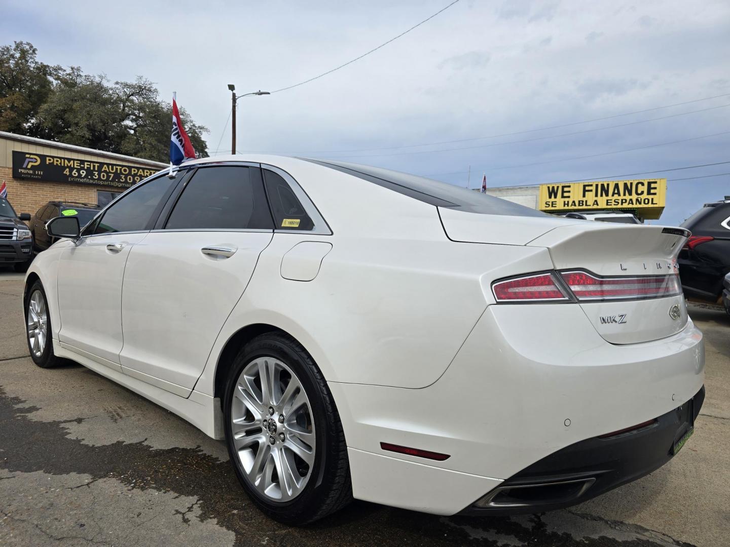 2016 DIAMOND WHITE Lincoln MKZ (3LN6L2J97GR) with an 2.0L L4 DOHC 16V engine, 6A transmission, located at 2660 S.Garland Avenue, Garland, TX, 75041, (469) 298-3118, 32.885551, -96.655602 - Photo#5