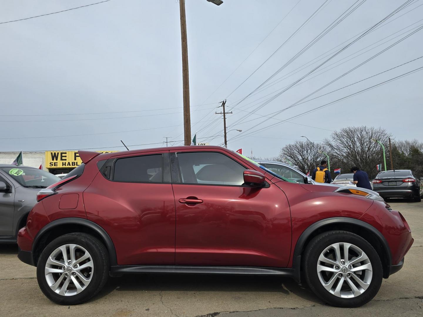 2016 RED Nissan Juke S (JN8AF5MR2GT) with an 1.6L L4 DOHC 16V TURBO engine, CVT transmission, located at 2660 S.Garland Avenue, Garland, TX, 75041, (469) 298-3118, 32.885551, -96.655602 - Photo#2