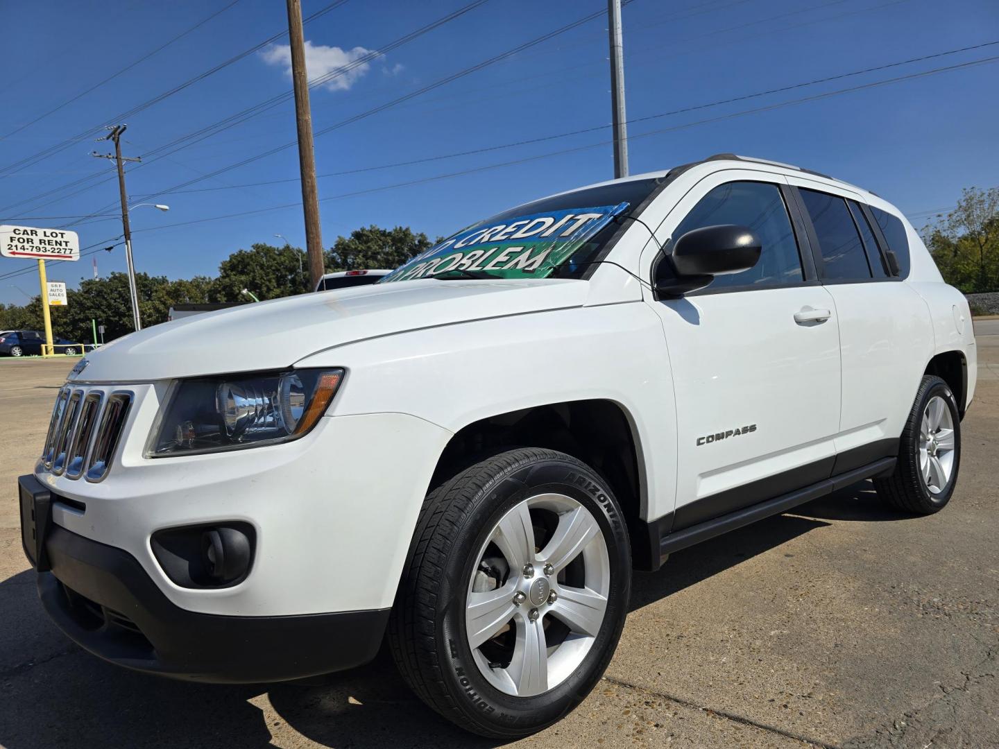 2017 WHITE Jeep Compass Sport (1C4NJCBA8HD) with an 2.0L L4 DOHC 16V engine, AUTO transmission, located at 2660 S.Garland Avenue, Garland, TX, 75041, (469) 298-3118, 32.885551, -96.655602 - Photo#7