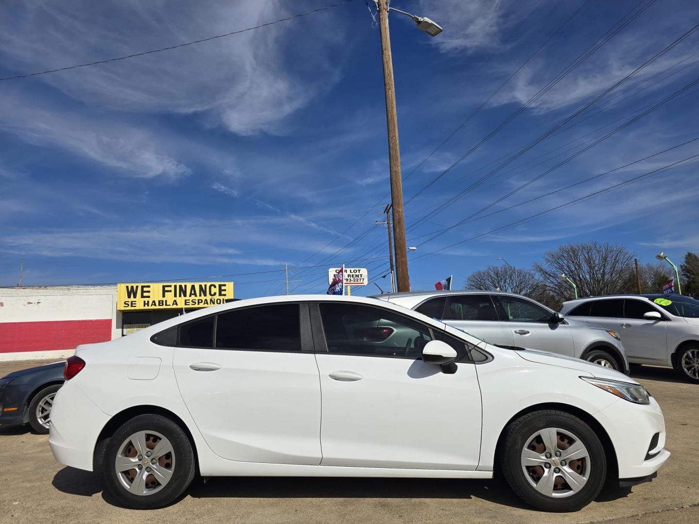 2018 BLACK Chevrolet Cruze LS (1G1BC5SM9J7) with an 1.4L L4 DOHC 16V TURBO engine, 6A transmission, located at 2660 S.Garland Avenue, Garland, TX, 75041, (469) 298-3118, 32.885551, -96.655602 - Photo#2