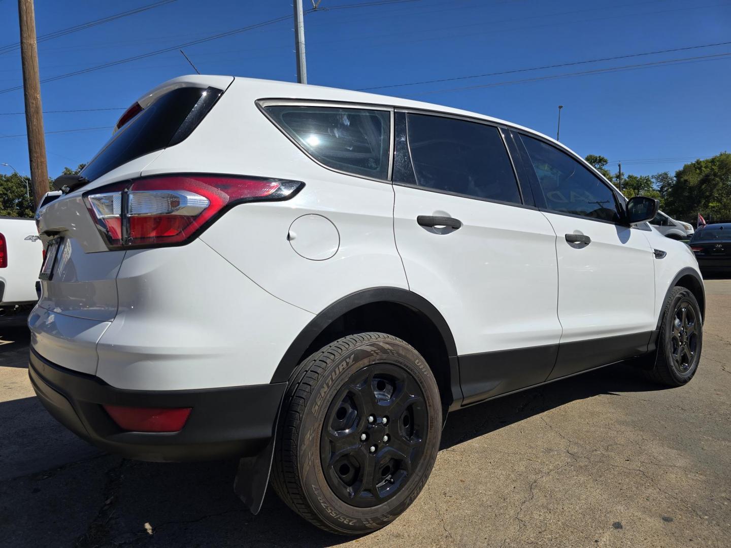 2018 Ford Escape S (1FMCU0F77JU) with an 2.5L L4 DOHC 16V engine, 6A transmission, located at 2660 S.Garland Avenue, Garland, TX, 75041, (469) 298-3118, 32.885551, -96.655602 - Welcome to DallasAutos4Less, one of the Premier BUY HERE PAY HERE Dealers in the North Dallas Area. We specialize in financing to people with NO CREDIT or BAD CREDIT. We need proof of income, proof of residence, and a ID. Come buy your new car from us today!! This is a Super Clean 2018 FORD ESCAP - Photo#3