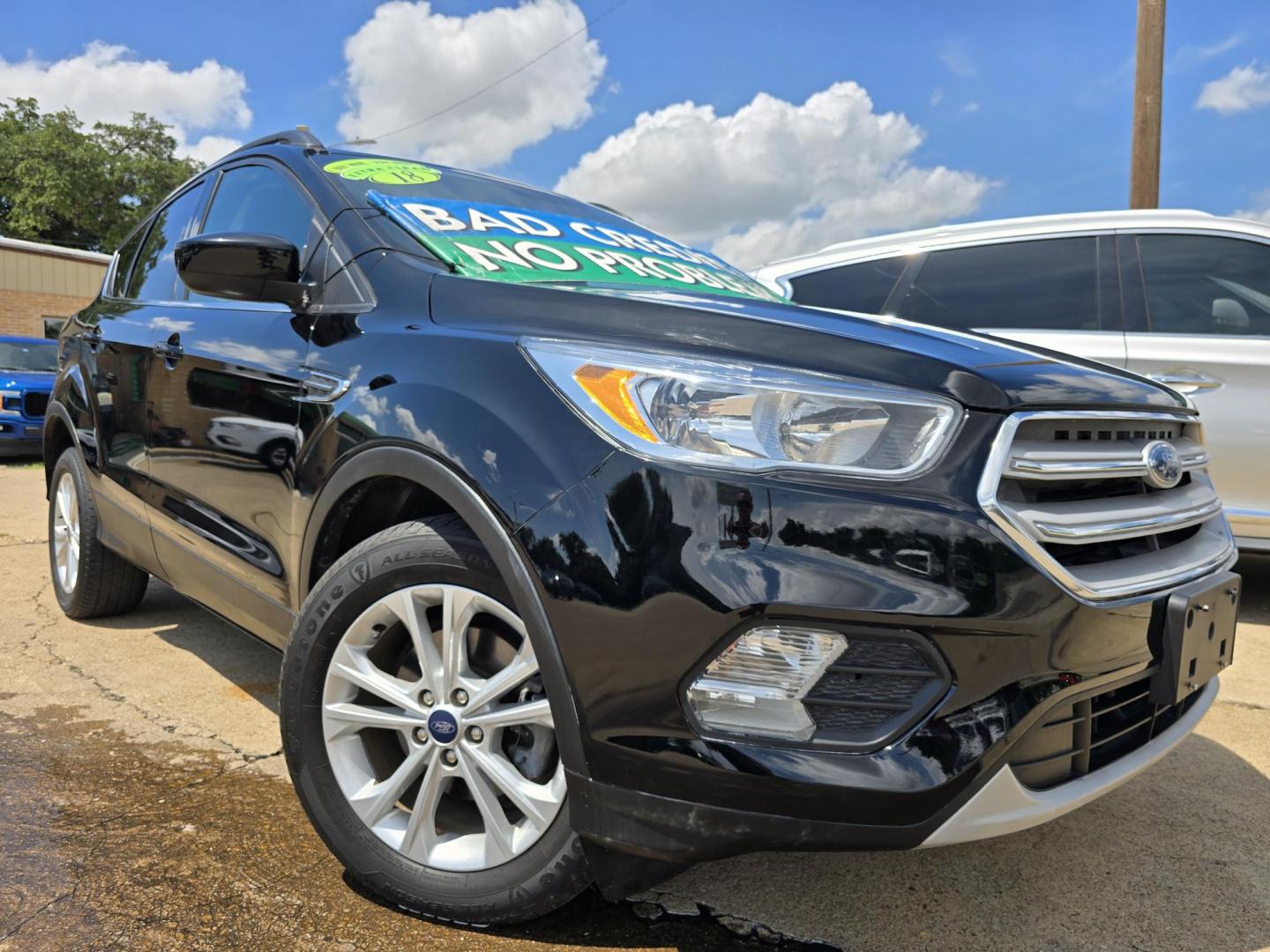 2018 BLACK Ford Escape SE (1FMCU0GD0JU) with an 1.5L L4 DOHC 16V engine, 6A transmission, located at 2660 S.Garland Avenue, Garland, TX, 75041, (469) 298-3118, 32.885551, -96.655602 - Photo#0