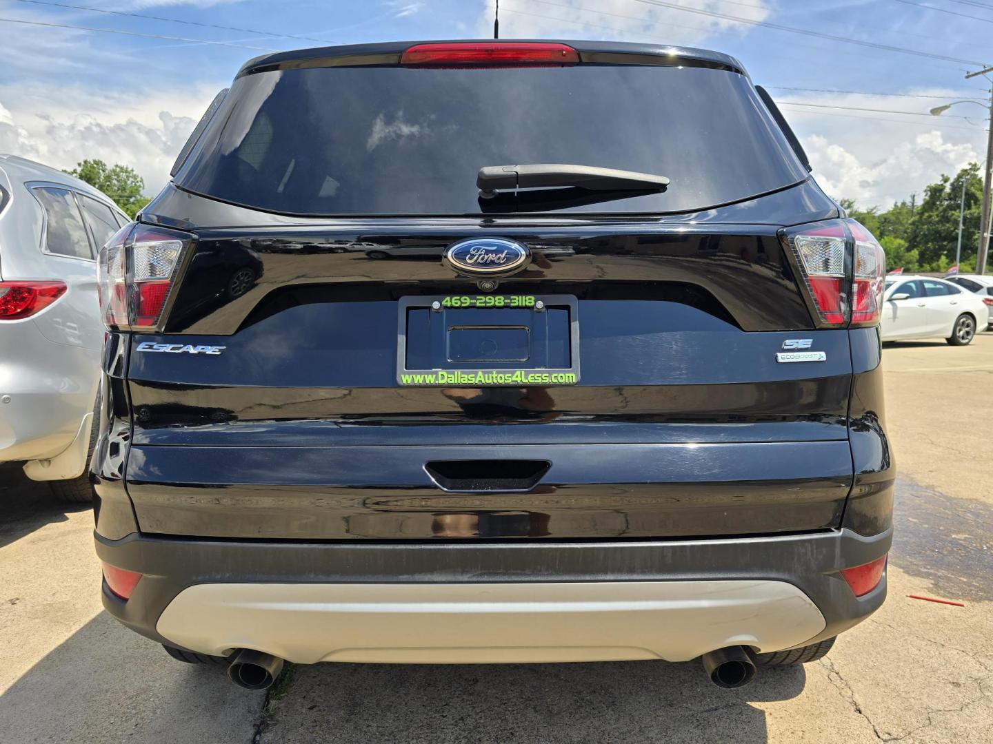 2018 BLACK Ford Escape SE (1FMCU0GD0JU) with an 1.5L L4 DOHC 16V engine, 6A transmission, located at 2660 S.Garland Avenue, Garland, TX, 75041, (469) 298-3118, 32.885551, -96.655602 - Photo#4