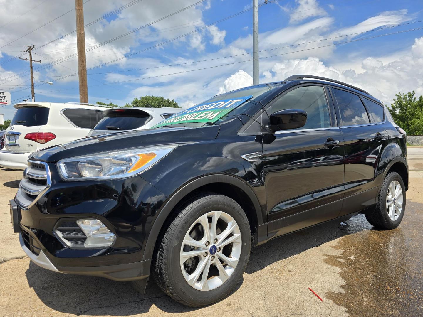 2018 BLACK Ford Escape SE (1FMCU0GD0JU) with an 1.5L L4 DOHC 16V engine, 6A transmission, located at 2660 S.Garland Avenue, Garland, TX, 75041, (469) 298-3118, 32.885551, -96.655602 - Photo#7