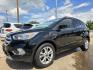 2018 BLACK Ford Escape SE (1FMCU0GD0JU) with an 1.5L L4 DOHC 16V engine, 6A transmission, located at 2660 S.Garland Avenue, Garland, TX, 75041, (469) 298-3118, 32.885551, -96.655602 - Photo#7