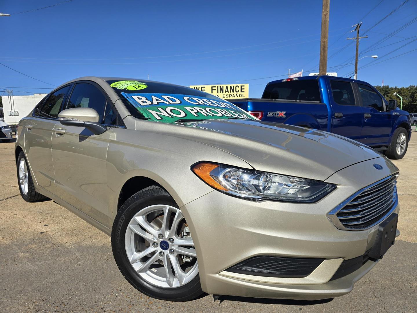 2018 GOLD Ford Fusion SE (3FA6P0HD9JR) with an 1.5L L4 DOHC 16V engine, 6A transmission, located at 2660 S.Garland Avenue, Garland, TX, 75041, (469) 298-3118, 32.885551, -96.655602 - Photo#0
