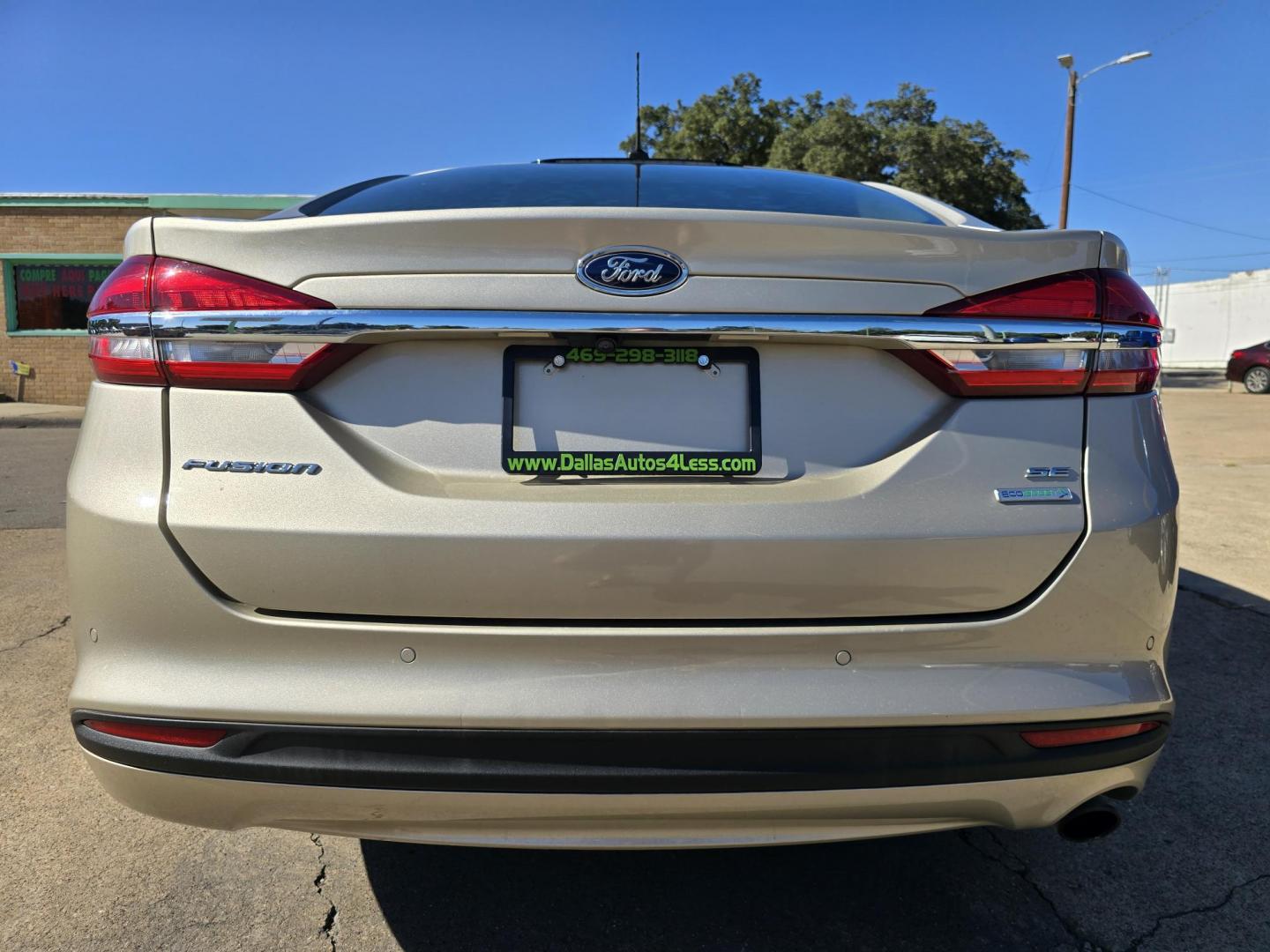 2018 GOLD Ford Fusion SE (3FA6P0HD9JR) with an 1.5L L4 DOHC 16V engine, 6A transmission, located at 2660 S.Garland Avenue, Garland, TX, 75041, (469) 298-3118, 32.885551, -96.655602 - Photo#4