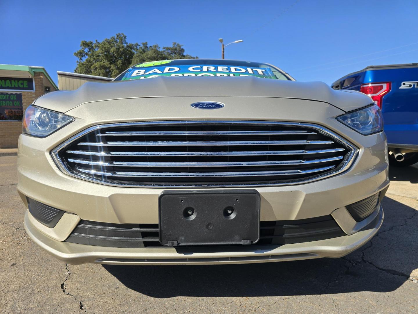 2018 GOLD Ford Fusion SE (3FA6P0HD9JR) with an 1.5L L4 DOHC 16V engine, 6A transmission, located at 2660 S.Garland Avenue, Garland, TX, 75041, (469) 298-3118, 32.885551, -96.655602 - Photo#9