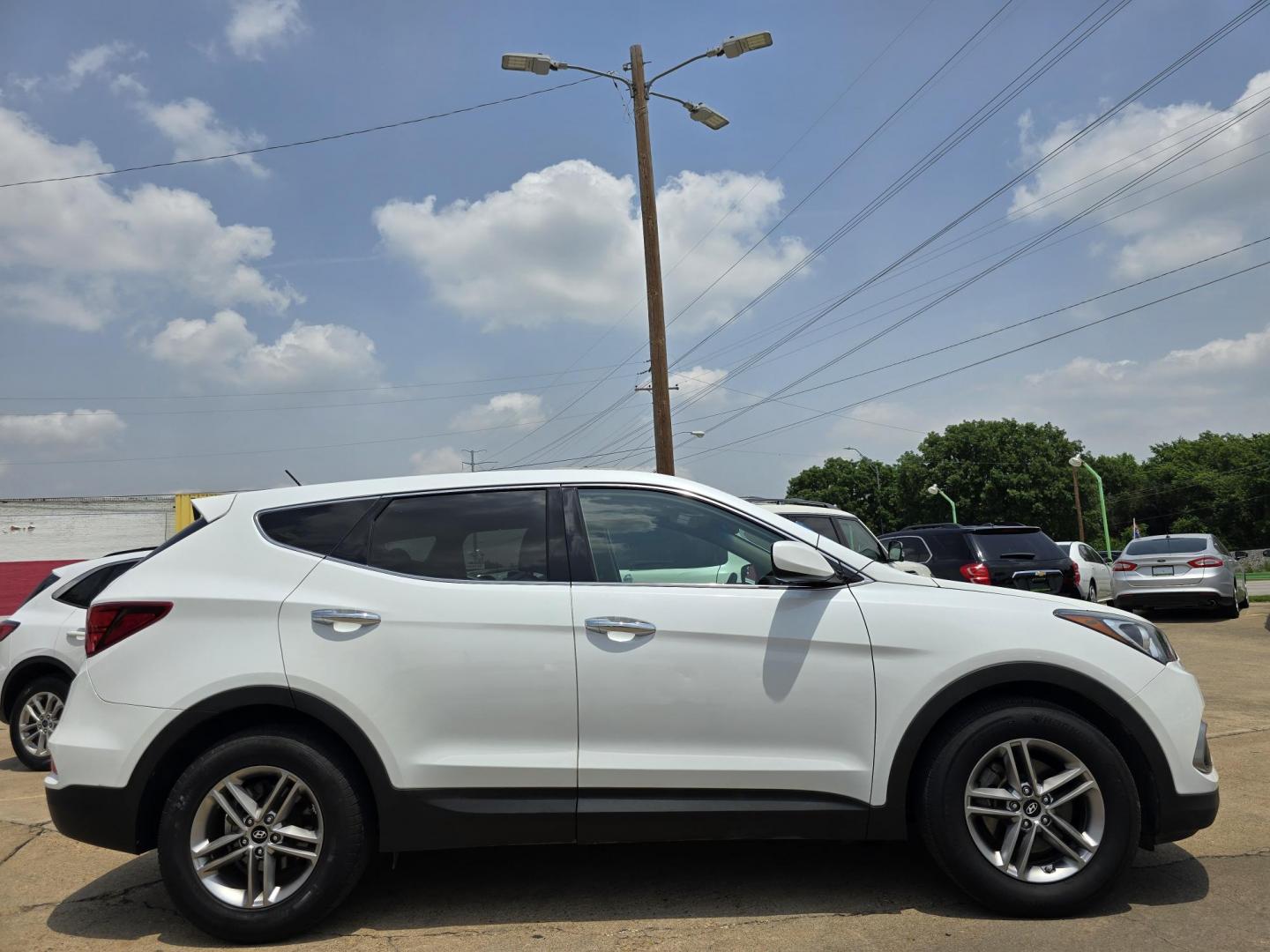 2018 DIAMOND WHITE Hyundai Santa Fe Sport (5NMZT3LB4JH) with an 2.4L L4 DOHC 16V engine, 6A transmission, located at 2660 S.Garland Avenue, Garland, TX, 75041, (469) 298-3118, 32.885551, -96.655602 - Welcome to DallasAutos4Less, one of the Premier BUY HERE PAY HERE Dealers in the North Dallas Area. We specialize in financing to people with NO CREDIT or BAD CREDIT. We need proof of income, proof of residence, and a ID. Come buy your new car from us today!! This is a Very clean 2018 HYUNDAI SAN - Photo#2