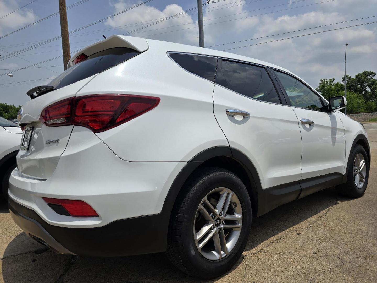 2018 DIAMOND WHITE Hyundai Santa Fe Sport (5NMZT3LB4JH) with an 2.4L L4 DOHC 16V engine, 6A transmission, located at 2660 S.Garland Avenue, Garland, TX, 75041, (469) 298-3118, 32.885551, -96.655602 - Welcome to DallasAutos4Less, one of the Premier BUY HERE PAY HERE Dealers in the North Dallas Area. We specialize in financing to people with NO CREDIT or BAD CREDIT. We need proof of income, proof of residence, and a ID. Come buy your new car from us today!! This is a Very clean 2018 HYUNDAI SAN - Photo#3