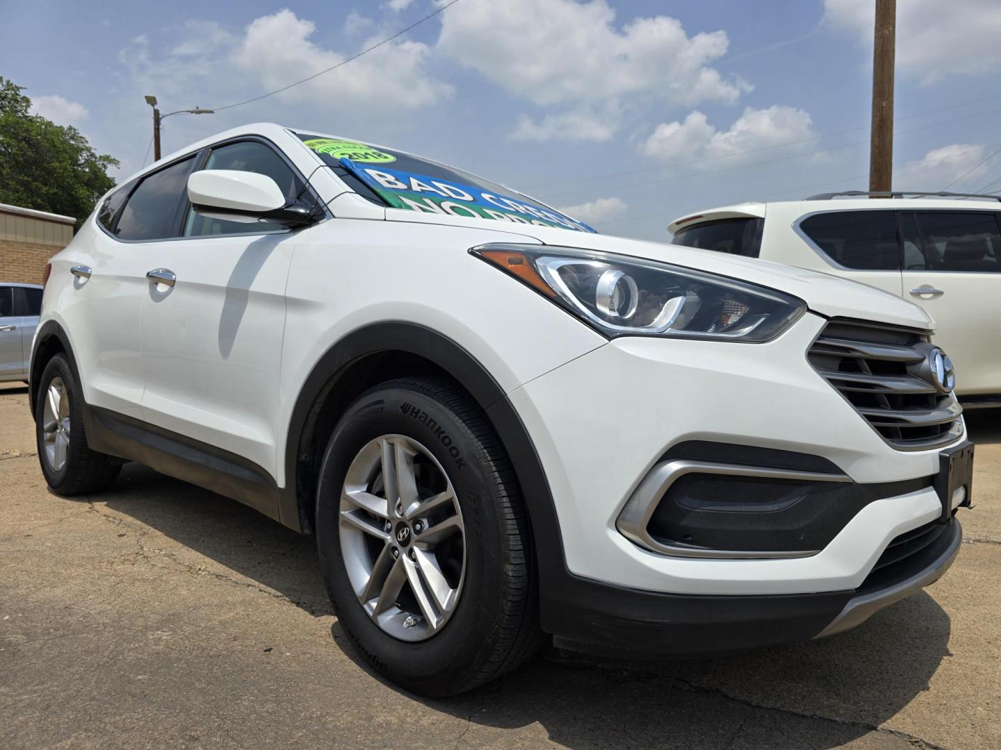 2018 DIAMOND WHITE Hyundai Santa Fe Sport (5NMZT3LB4JH) with an 2.4L L4 DOHC 16V engine, 6A transmission, located at 2660 S.Garland Avenue, Garland, TX, 75041, (469) 298-3118, 32.885551, -96.655602 - Welcome to DallasAutos4Less, one of the Premier BUY HERE PAY HERE Dealers in the North Dallas Area. We specialize in financing to people with NO CREDIT or BAD CREDIT. We need proof of income, proof of residence, and a ID. Come buy your new car from us today!! This is a Very clean 2018 HYUNDAI SAN - Photo#1
