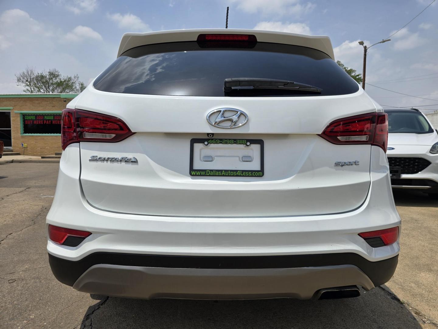 2018 DIAMOND WHITE Hyundai Santa Fe Sport (5NMZT3LB4JH) with an 2.4L L4 DOHC 16V engine, 6A transmission, located at 2660 S.Garland Avenue, Garland, TX, 75041, (469) 298-3118, 32.885551, -96.655602 - Welcome to DallasAutos4Less, one of the Premier BUY HERE PAY HERE Dealers in the North Dallas Area. We specialize in financing to people with NO CREDIT or BAD CREDIT. We need proof of income, proof of residence, and a ID. Come buy your new car from us today!! This is a Very clean 2018 HYUNDAI SAN - Photo#4