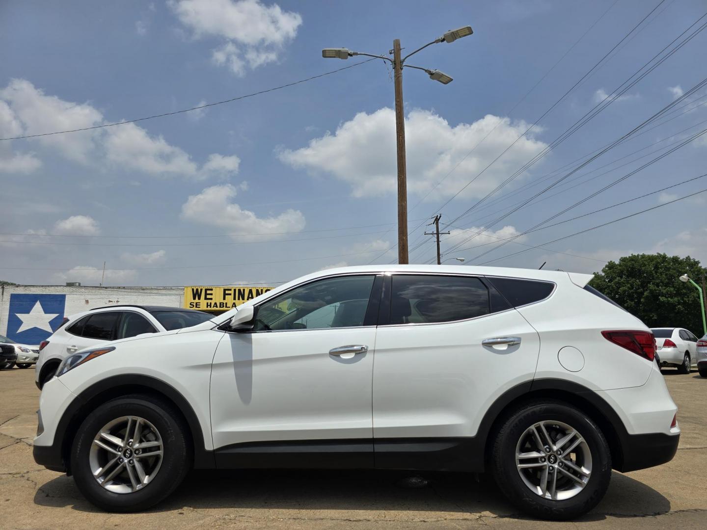 2018 DIAMOND WHITE Hyundai Santa Fe Sport (5NMZT3LB4JH) with an 2.4L L4 DOHC 16V engine, 6A transmission, located at 2660 S.Garland Avenue, Garland, TX, 75041, (469) 298-3118, 32.885551, -96.655602 - Welcome to DallasAutos4Less, one of the Premier BUY HERE PAY HERE Dealers in the North Dallas Area. We specialize in financing to people with NO CREDIT or BAD CREDIT. We need proof of income, proof of residence, and a ID. Come buy your new car from us today!! This is a Very clean 2018 HYUNDAI SAN - Photo#6