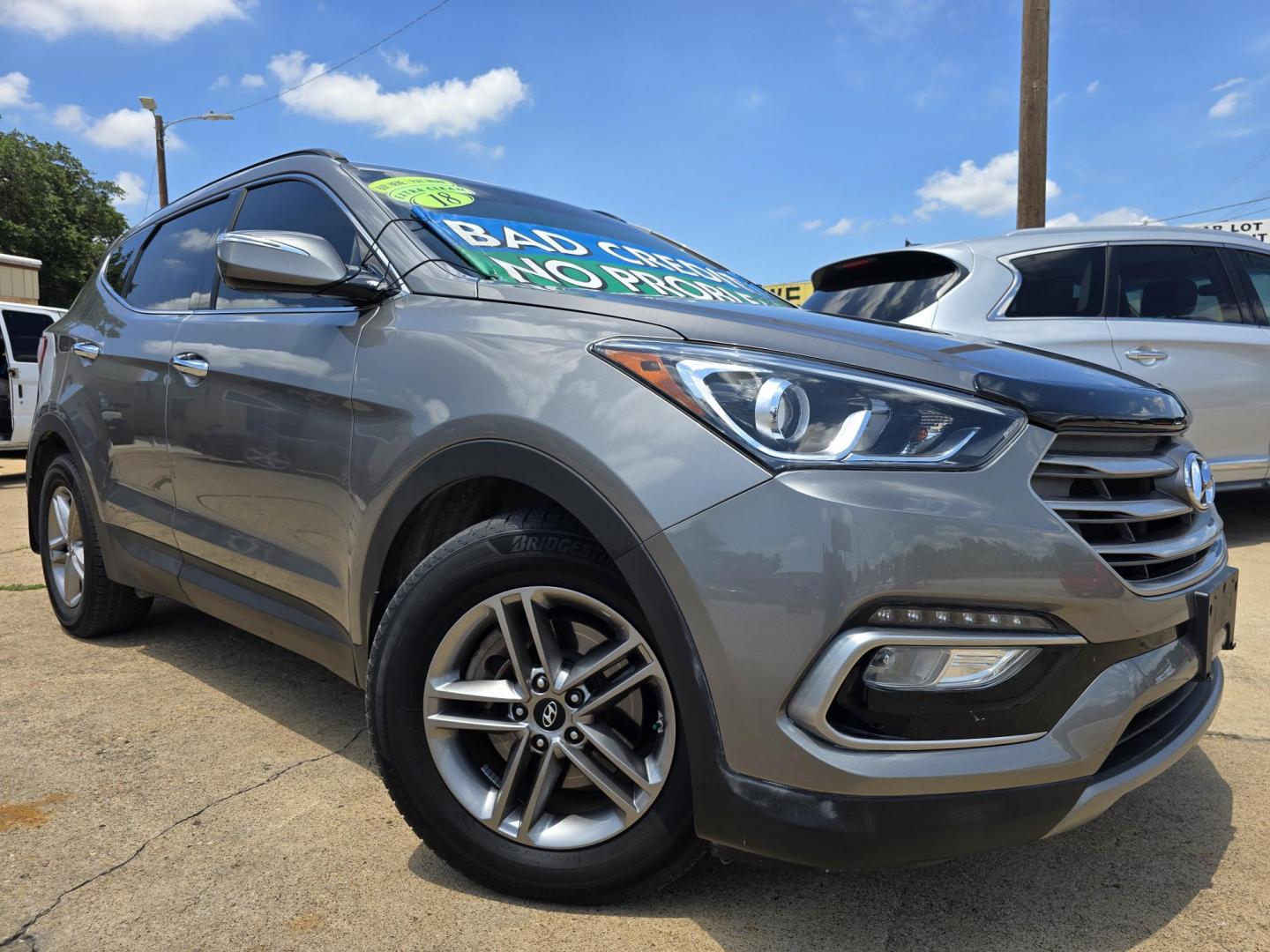 2018 GRAY Hyundai Santa Fe Sport (5XYZU3LB3JG) with an 2.4L L4 DOHC 16V engine, 6A transmission, located at 2660 S.Garland Avenue, Garland, TX, 75041, (469) 298-3118, 32.885551, -96.655602 - Photo#0