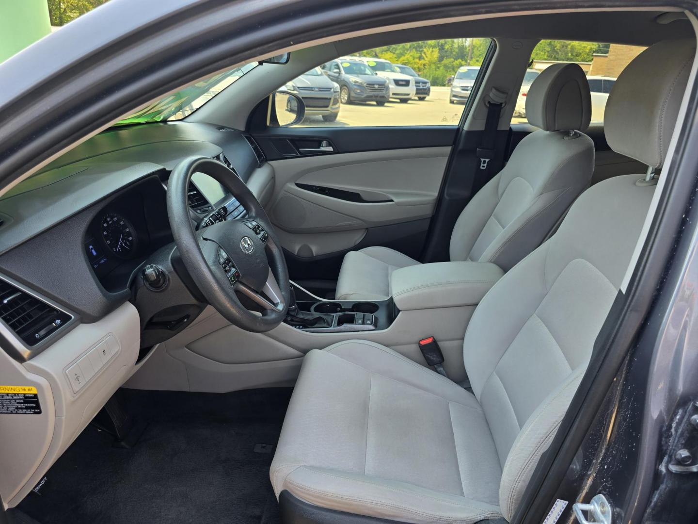 2018 GRAY Hyundai Tucson SE (KM8J33A43JU) with an 2.0L L4 DOHC 16V engine, 6A transmission, located at 2660 S.Garland Avenue, Garland, TX, 75041, (469) 298-3118, 32.885551, -96.655602 - Photo#12