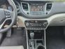2018 GRAY Hyundai Tucson SE (KM8J33A43JU) with an 2.0L L4 DOHC 16V engine, 6A transmission, located at 2660 S.Garland Avenue, Garland, TX, 75041, (469) 298-3118, 32.885551, -96.655602 - Photo#14