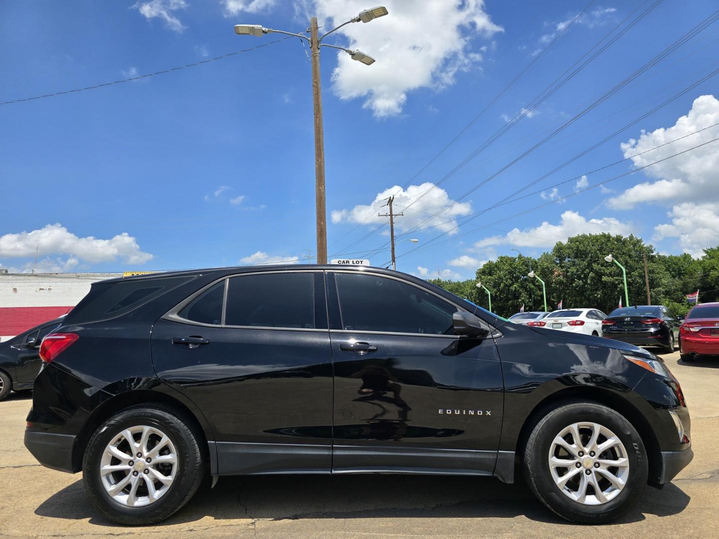 2019 BLACK Chevrolet Equinox LS (3GNAXHEV2KL) with an 1.5L L4 DIR DOHC 16V TURBO engine, 6A transmission, located at 2660 S.Garland Avenue, Garland, TX, 75041, (469) 298-3118, 32.885551, -96.655602 - Welcome to DallasAutos4Less, one of the Premier BUY HERE PAY HERE Dealers in the North Dallas Area. We specialize in financing to people with NO CREDIT or BAD CREDIT. We need proof of income, proof of residence, and a ID. Come buy your new car from us today!! This is a very well cared for 2019 Ch - Photo#2