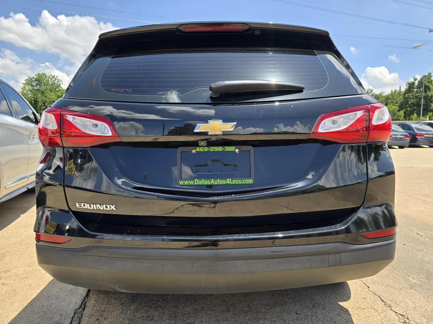 2019 BLACK Chevrolet Equinox LS (3GNAXHEV2KL) with an 1.5L L4 DIR DOHC 16V TURBO engine, 6A transmission, located at 2660 S.Garland Avenue, Garland, TX, 75041, (469) 298-3118, 32.885551, -96.655602 - Welcome to DallasAutos4Less, one of the Premier BUY HERE PAY HERE Dealers in the North Dallas Area. We specialize in financing to people with NO CREDIT or BAD CREDIT. We need proof of income, proof of residence, and a ID. Come buy your new car from us today!! This is a very well cared for 2019 Ch - Photo#4