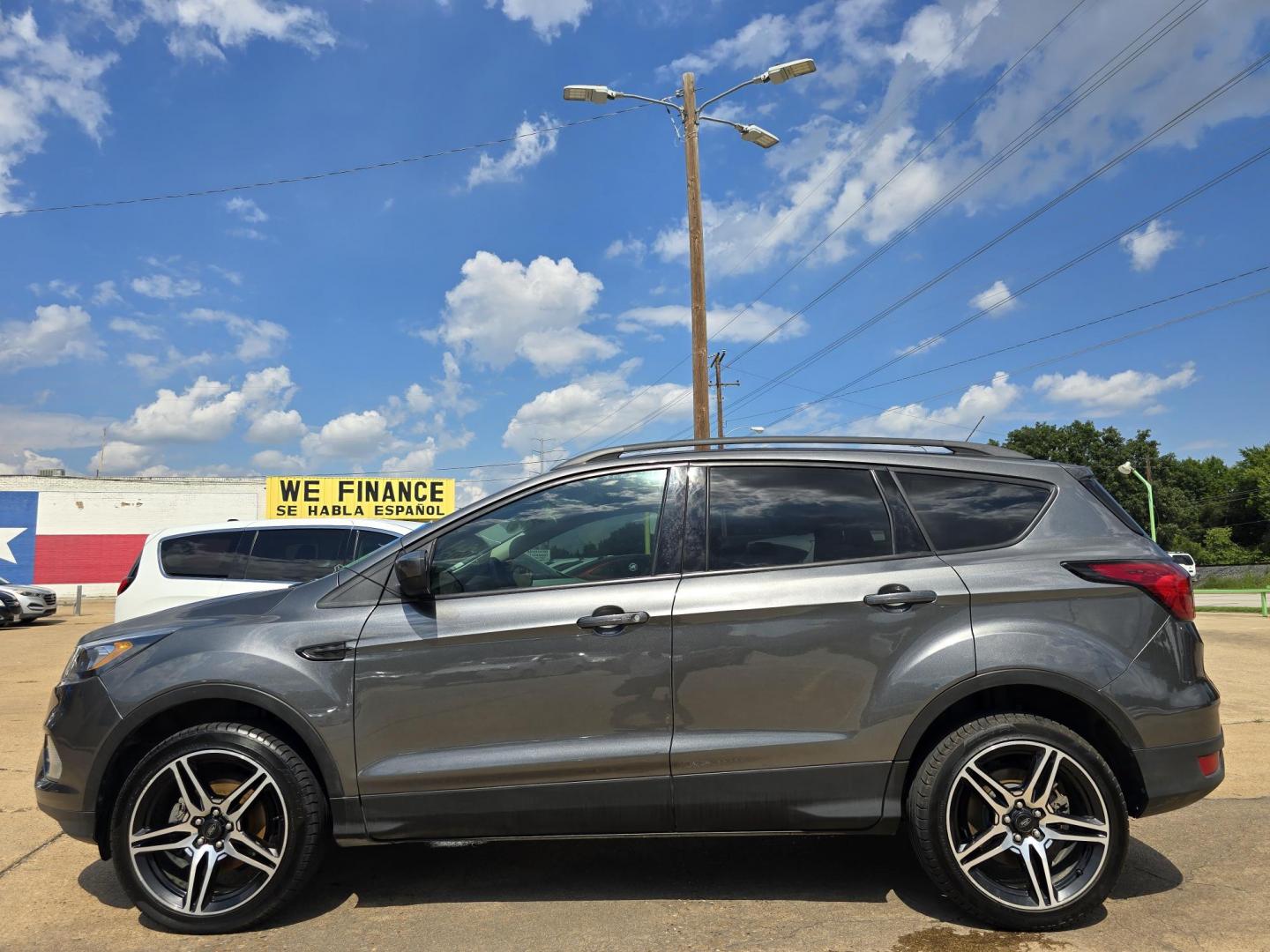 2019 GRAY Ford Escape SEL (1FMCU0HD2KU) , AUTO transmission, located at 2660 S.Garland Avenue, Garland, TX, 75041, (469) 298-3118, 32.885551, -96.655602 - Welcome to DallasAutos4Less, one of the Premier BUY HERE PAY HERE Dealers in the North Dallas Area. We specialize in financing to people with NO CREDIT or BAD CREDIT. We need proof of income, proof of residence, and a ID. Come buy your new car from us today!! This is a Super Clean 2019 FORD ESCAP - Photo#6