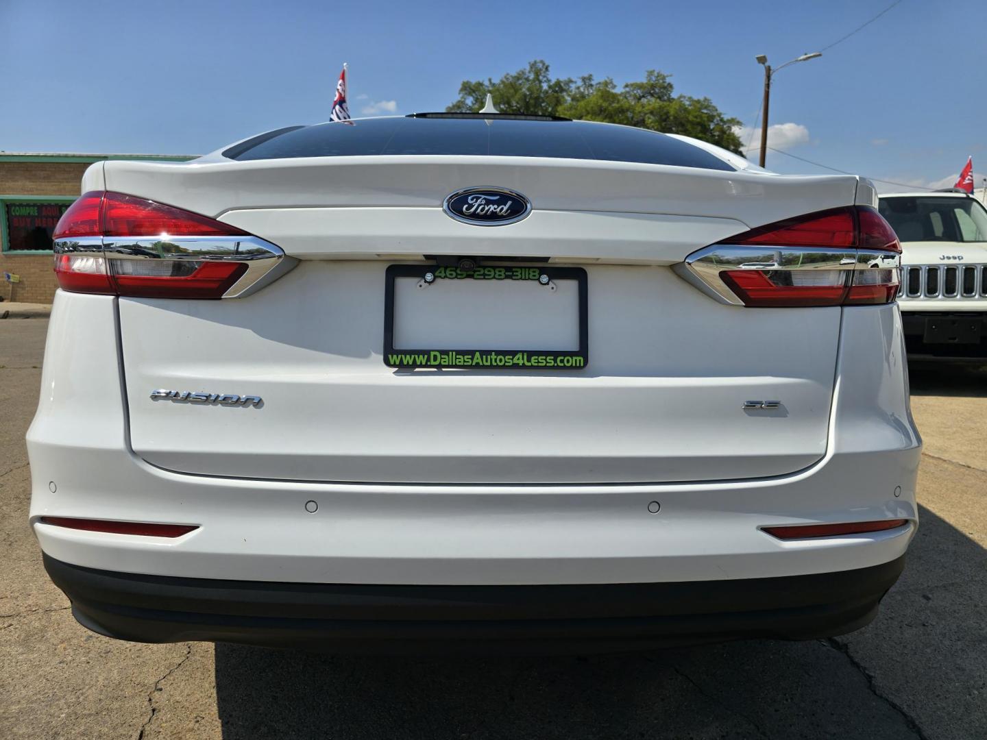 2019 WHITE /BEIGE Ford Fusion SE (3FA6P0H70KR) , AUTO transmission, located at 2660 S.Garland Avenue, Garland, TX, 75041, (469) 298-3118, 32.885551, -96.655602 - Welcome to DallasAutos4Less, one of the Premier BUY HERE PAY HERE Dealers in the North Dallas Area. We specialize in financing to people with NO CREDIT or BAD CREDIT. We need proof of income, proof of residence, and a ID. Come buy your new car from us today!! This is a 2019 FORD FUSION SE SEDAN! - Photo#4