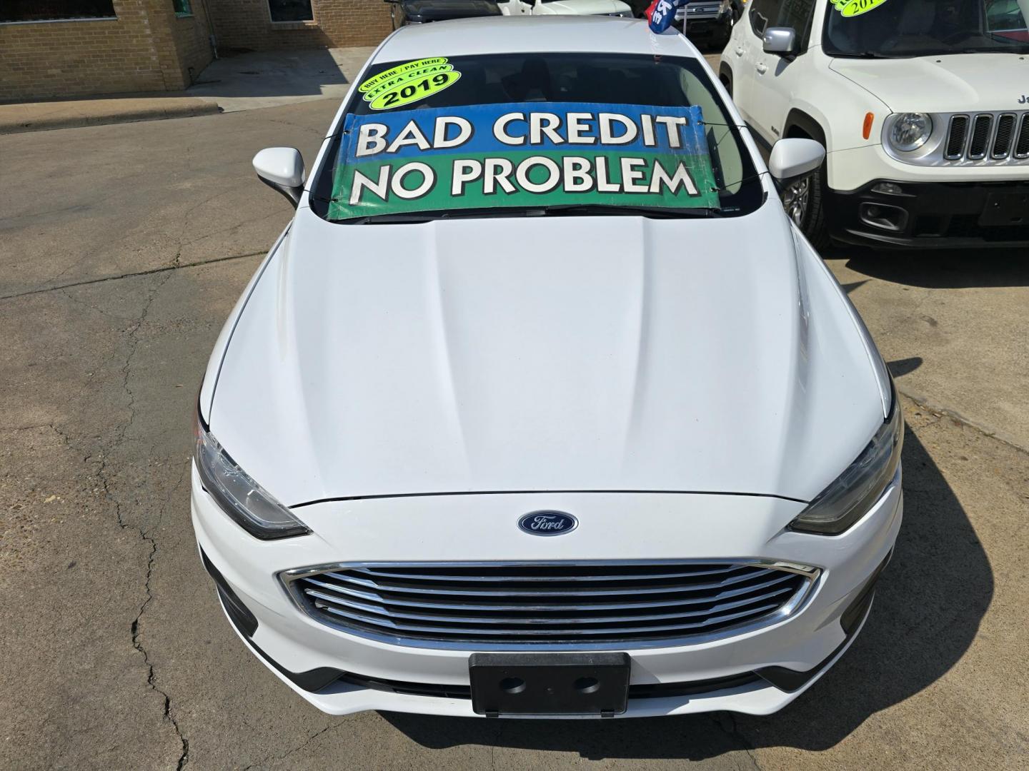 2019 WHITE /BEIGE Ford Fusion SE (3FA6P0H70KR) , AUTO transmission, located at 2660 S.Garland Avenue, Garland, TX, 75041, (469) 298-3118, 32.885551, -96.655602 - Welcome to DallasAutos4Less, one of the Premier BUY HERE PAY HERE Dealers in the North Dallas Area. We specialize in financing to people with NO CREDIT or BAD CREDIT. We need proof of income, proof of residence, and a ID. Come buy your new car from us today!! This is a 2019 FORD FUSION SE SEDAN! - Photo#8