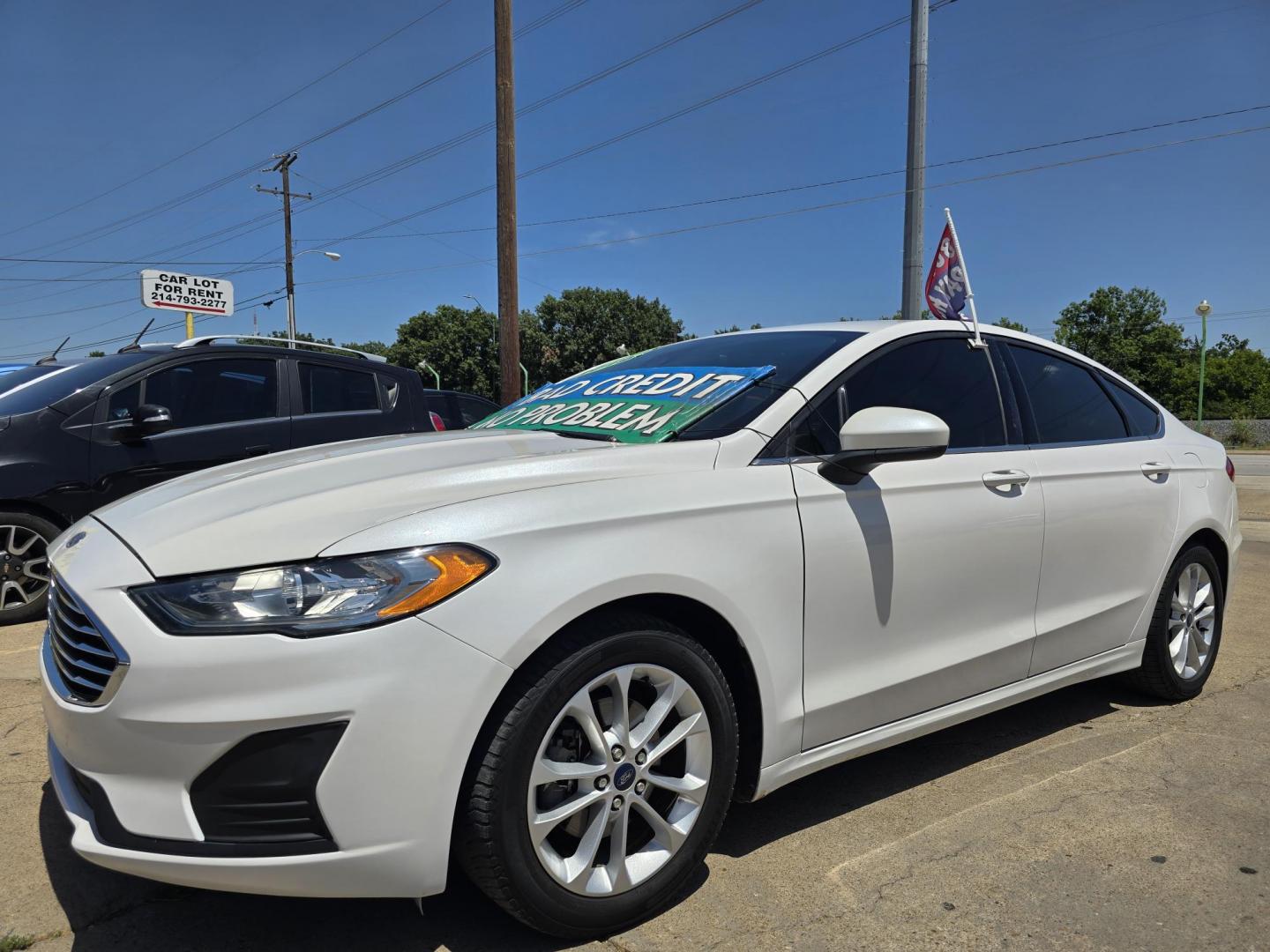 2019 DIAMOND WHITE Ford Fusion SE (3FA6P0HD8KR) with an 1.5L L4 DOHC 16V engine, 6A transmission, located at 2660 S.Garland Avenue, Garland, TX, 75041, (469) 298-3118, 32.885551, -96.655602 - Photo#7